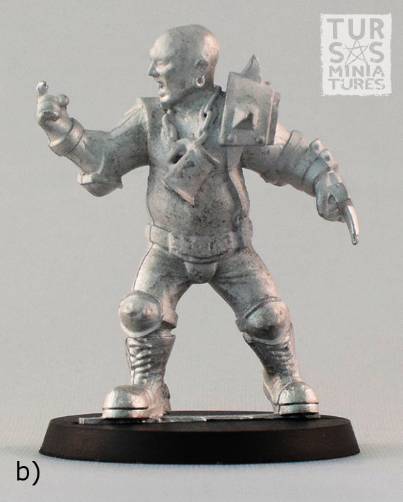b) A photograph of the cast metal version of the miniature